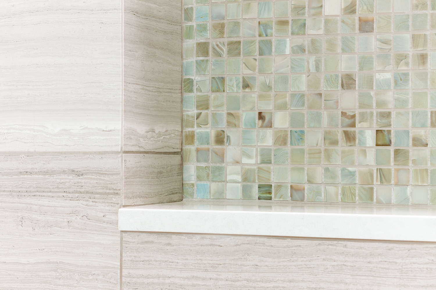 georgina bathroom tile in white and tan with teal and blue accents