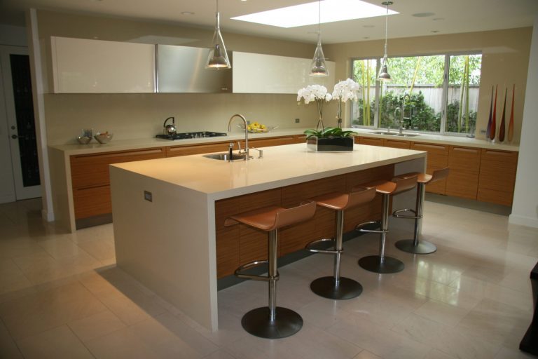 wetherly kitchen with wood cupboards and beige countertops