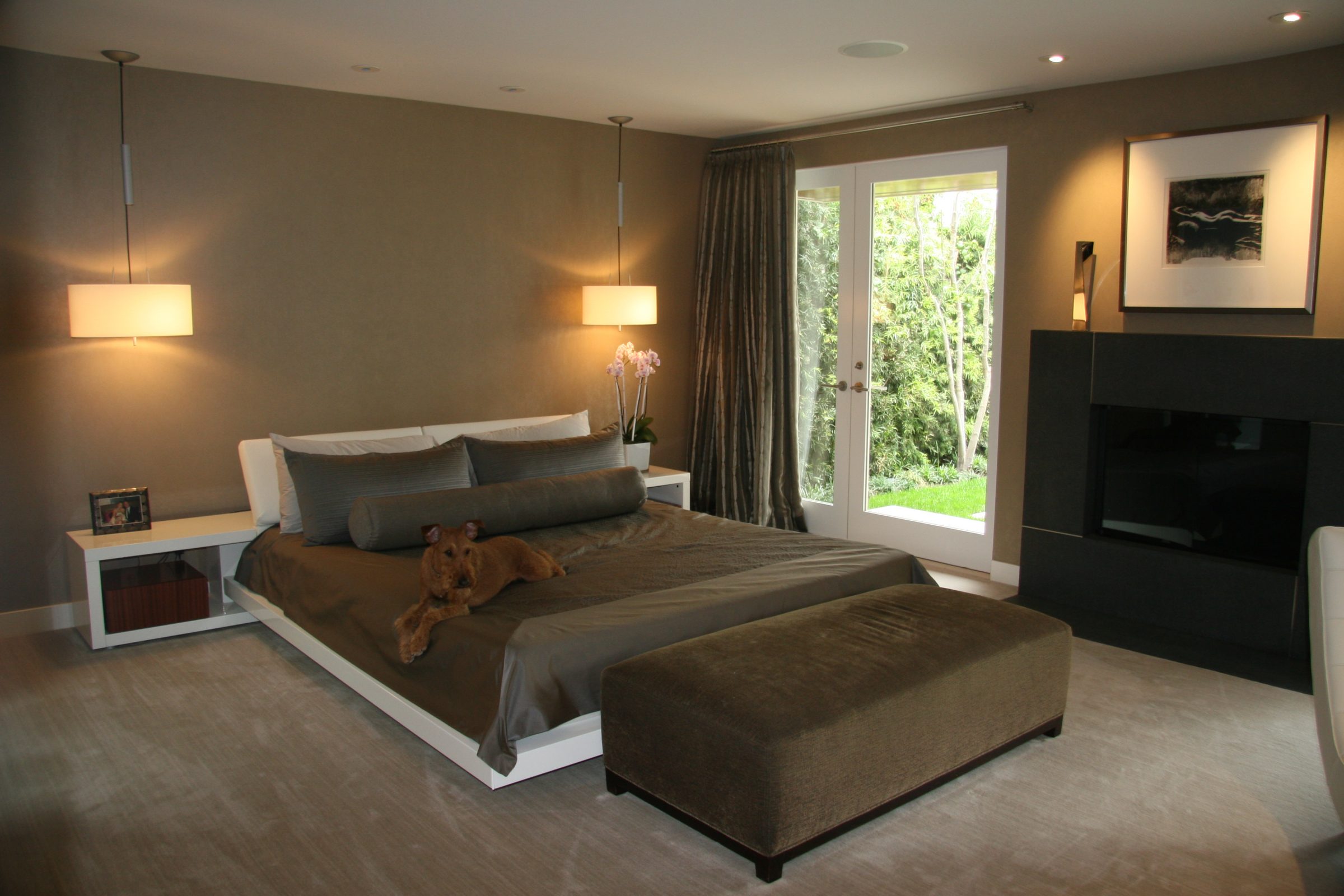 bedroom contemporary with double doors leading to the outside